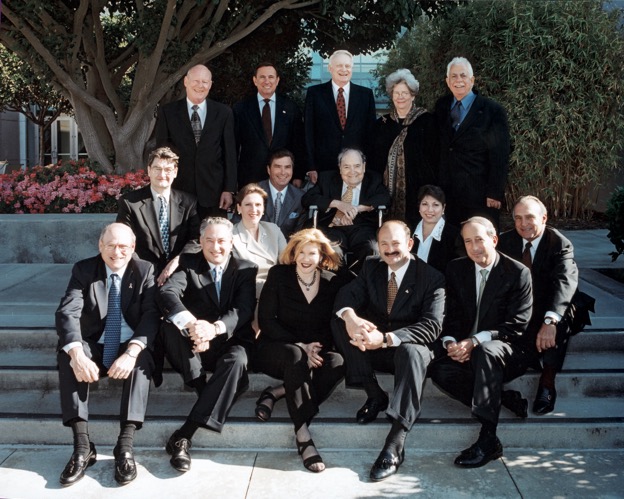 A group of people posing for a photo

Description automatically generated